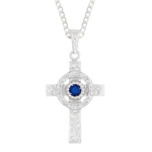 A custom silver celtic cross pendant necklace for men and women, western-inspired design. featuring blur zirconia stone 